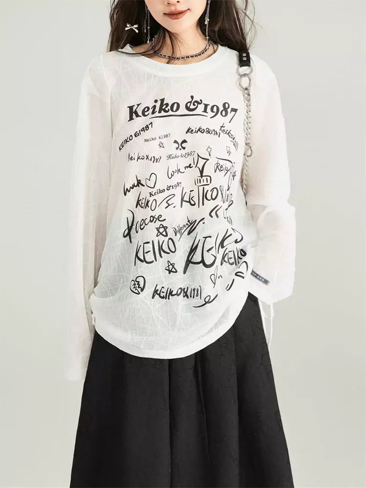 Camiseta holgada con cordón ajustable y estampado de mariposas bordadas