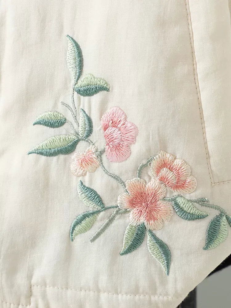 Embroidered Floral Vest with Ruffled Stand Collar