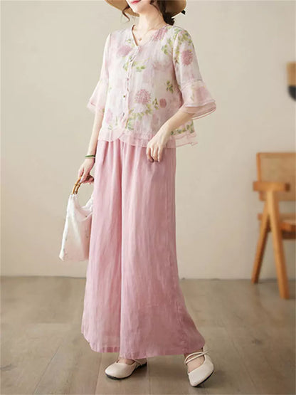 Conjunto de camisa y pantalón de lino con ramio floral: blusa de manga 3/4 y pantalón ancho.