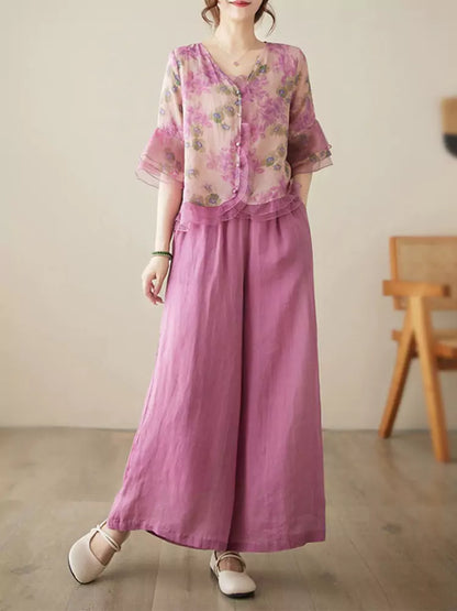 Conjunto de camisa y pantalón de lino con ramio floral: blusa de manga 3/4 y pantalón ancho.