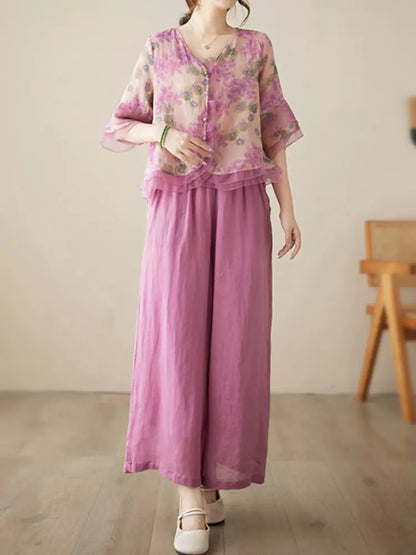 Conjunto de camisa y pantalón de lino con ramio floral: blusa de manga 3/4 y pantalón ancho.