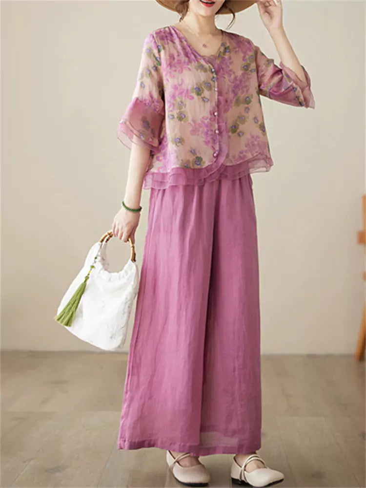 Conjunto de camisa y pantalón de lino con ramio floral: blusa de manga 3/4 y pantalón ancho.