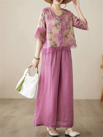 Conjunto de camisa y pantalón de lino con ramio floral: blusa de manga 3/4 y pantalón ancho.