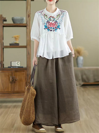 Aufwendig bestickte Babydoll-Bluse aus Ramie mit Stehkragen und Rüschen