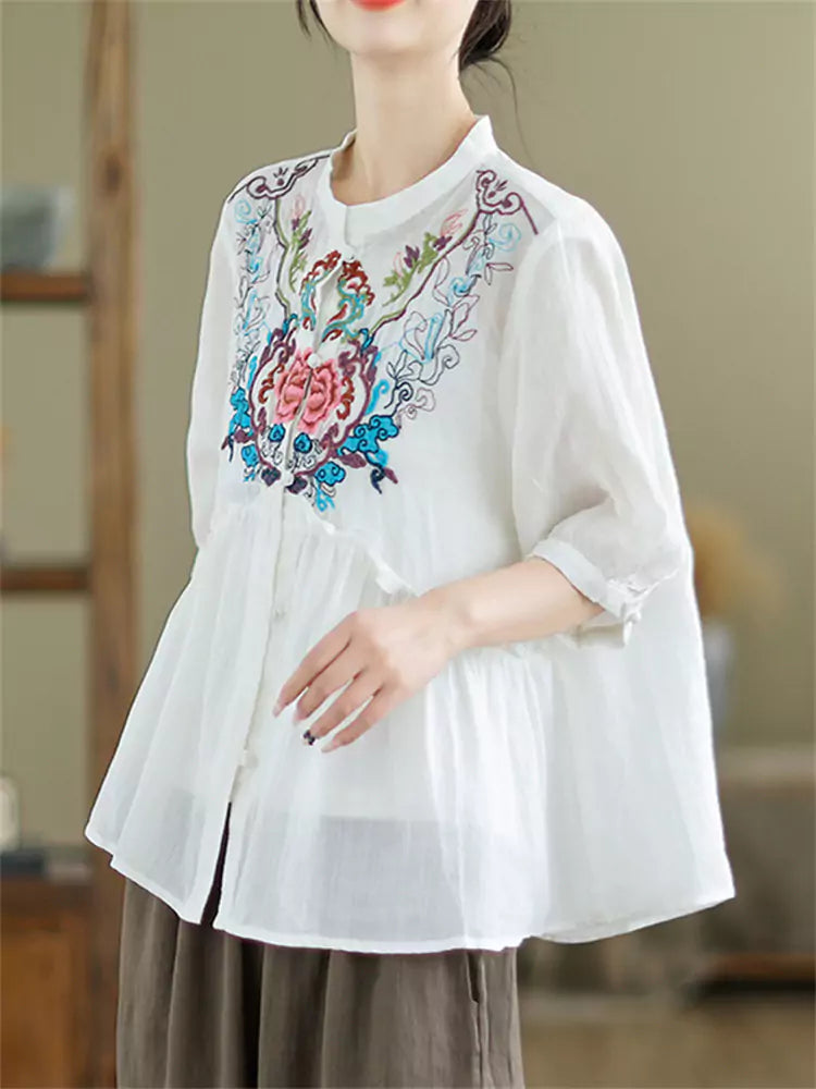 Intricate Embroidered Ramie Babydoll Blouse with Mandarin Collar and Ruffles