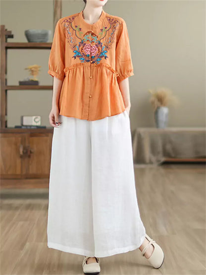 Aufwendig bestickte Babydoll-Bluse aus Ramie mit Stehkragen und Rüschen