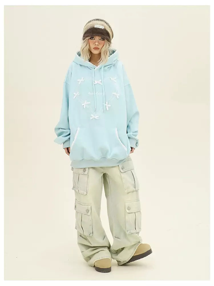 Niedlicher, kuscheliger und lockerer Herbst-Hoodie mit Schleifenherz.
