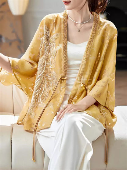 Damenbluse mit lockerer Passform, V-Ausschnitt, Fledermausärmeln und Perlenbesatz sowie Lochstickerei