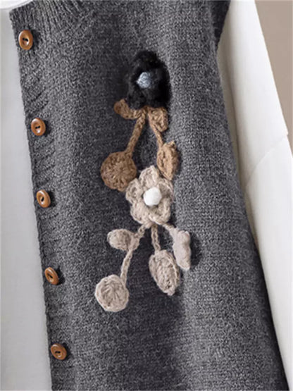 Kurze, lockere, schlichte, einreihige Strickweste mit Rundhalsausschnitt