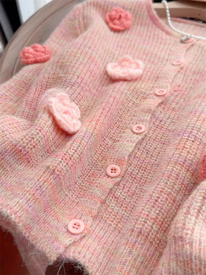 Cárdigan corto de punto con estampado floral y detalle de cordón