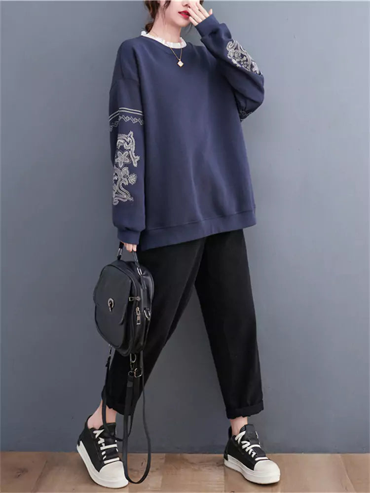 Oversize-Sweatshirt mit Rundhalsausschnitt und aufwendiger Stickerei und Spitzenbesatz