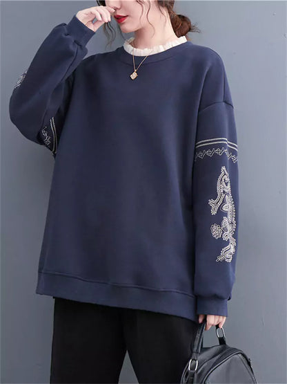 Sudadera de cuello redondo con ribete de encaje y bordado intenso de gran tamaño