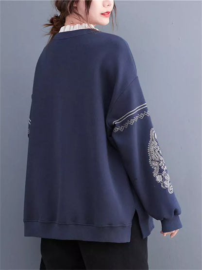 Sudadera de cuello redondo con ribete de encaje y bordado intenso de gran tamaño