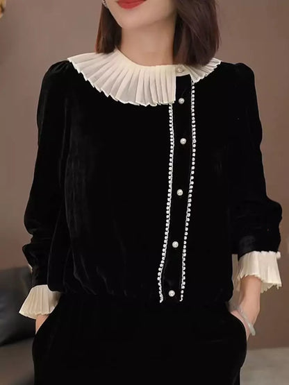 Hochwertige schwarze Samtbluse mit Rüschenkragen und langen Ärmeln