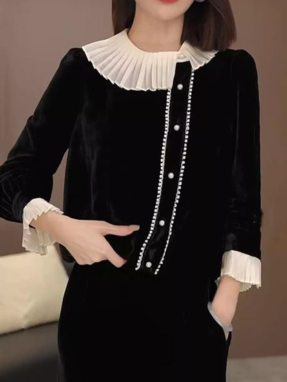 Hochwertige schwarze Samtbluse mit Rüschenkragen und langen Ärmeln