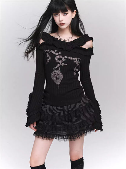 Schickes schwarzes Stretch-Strickoberteil mit Rüschenprint und Glockenärmeln