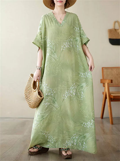 Locker geschnittenes Maxikleid im Vintage-Urlaubsstil aus Baumwoll-Leinen-Mischgewebe mit V-Ausschnitt