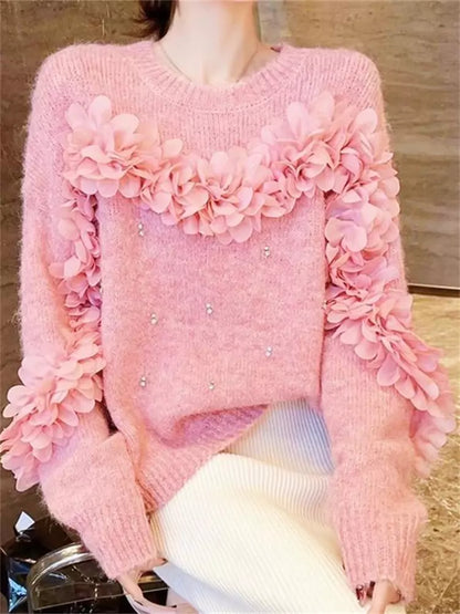Suéter rosa con flores 3D y adornos de diamantes de imitación: tejido único y elegante.
