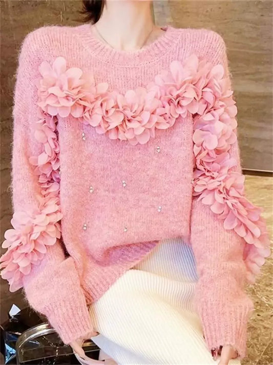 Suéter rosa con flores 3D y adornos de diamantes de imitación: tejido único y elegante.