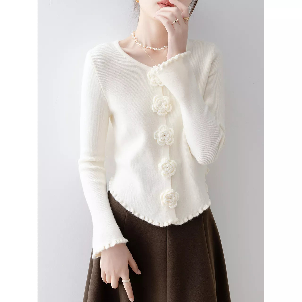 Elegant Purple Round Neck Knit Top with Floral & Ruffle Details