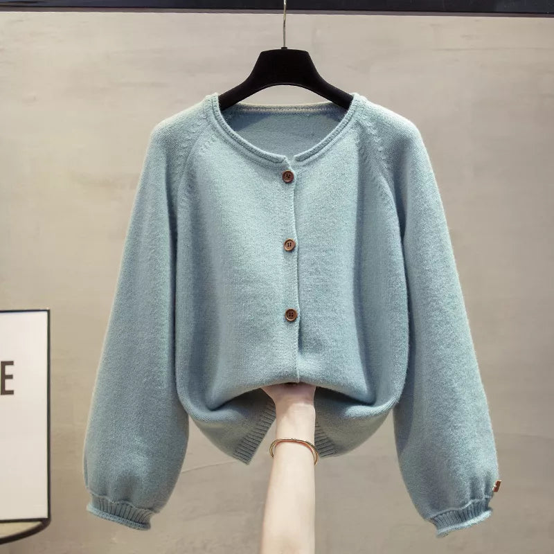Cárdigan de punto con cuello redondo y botones en color liso para mujer