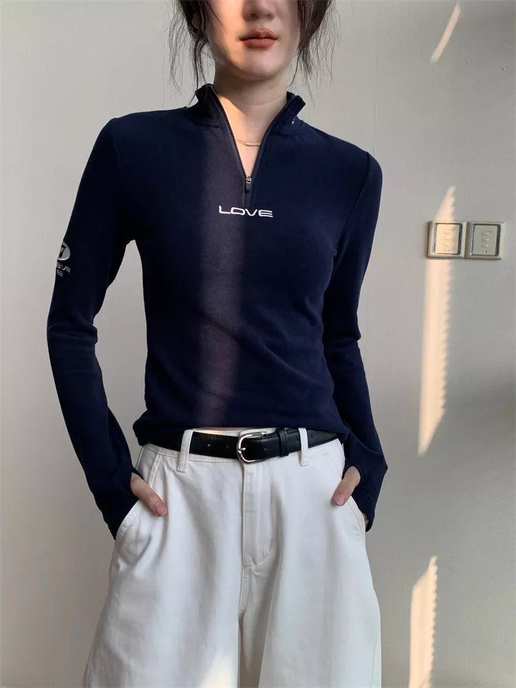 Halbgeschlossenes, langärmeliges, figurbetontes Oberteil mit Reißverschluss für Damen