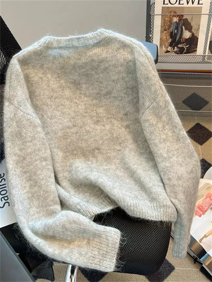 Soft and Cozy Knit Pullover Sweater with Floral Embellishments