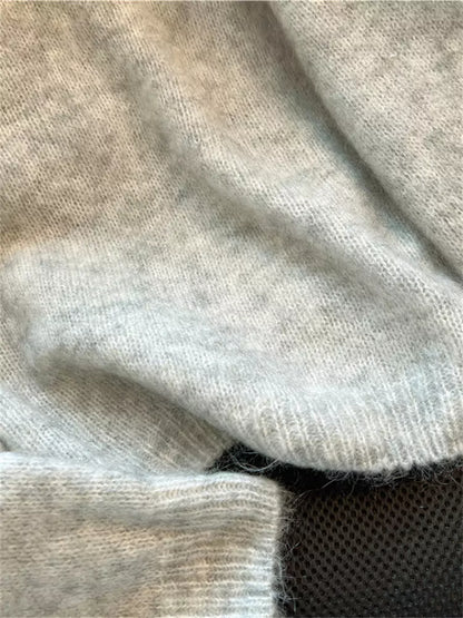 Soft and Cozy Knit Pullover Sweater with Floral Embellishments