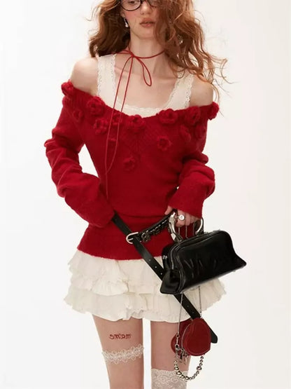 Suéter de punto suave con adorno floral y cintura ajustada