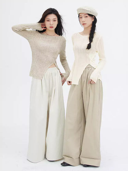 Suéter de punto suave con abertura lateral y botones diagonales al frente