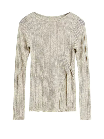 Suéter de punto suave con abertura lateral y botones diagonales al frente