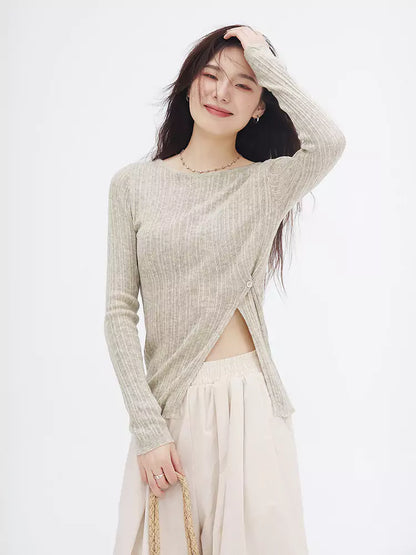 Suéter de punto suave con abertura lateral y botones diagonales al frente