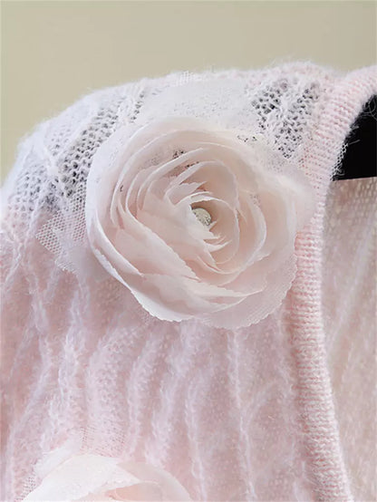 Suéter de punto corto con cuello en V y flores brillantes con detalles de diamantes