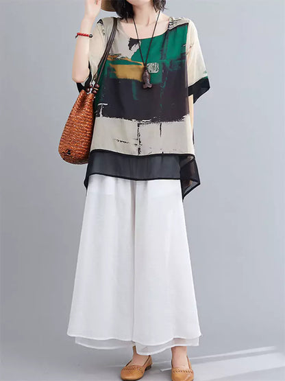 Stilvolle, übergroße Chiffonbluse mit kurzen Ärmeln und Print