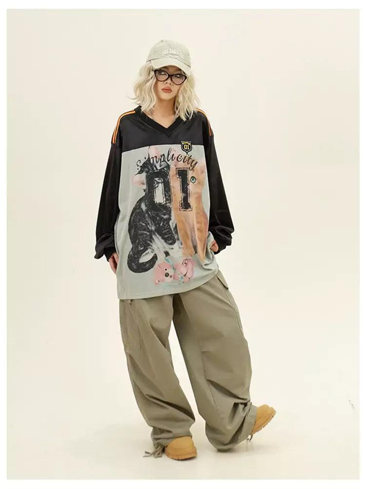 Vintage Oversized Langarmshirt mit Farbblockmuster und niedlichem Katzenmotiv