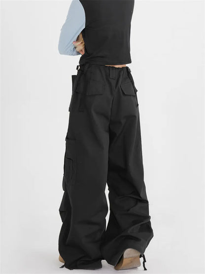 Pantalones cargo fruncidos con diseño de paracaídas vintage