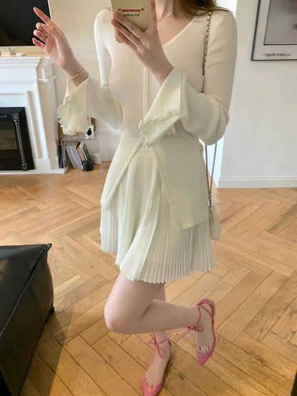 Top de punto ajustado con mangas acampanadas y cuello en V vintage