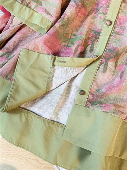 Grüne, bedruckte Damenbluse aus Baumwoll-Leinen-Mischgewebe mit 3/4-Ärmeln und lockerer, mittellanger Passform.