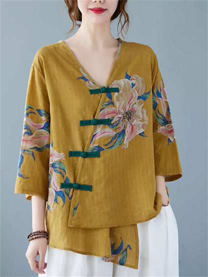 Gelbe Damenbluse aus Baumwoll-Leinen-Mischgewebe mit V-Ausschnitt und unregelmäßigem Blumenmuster